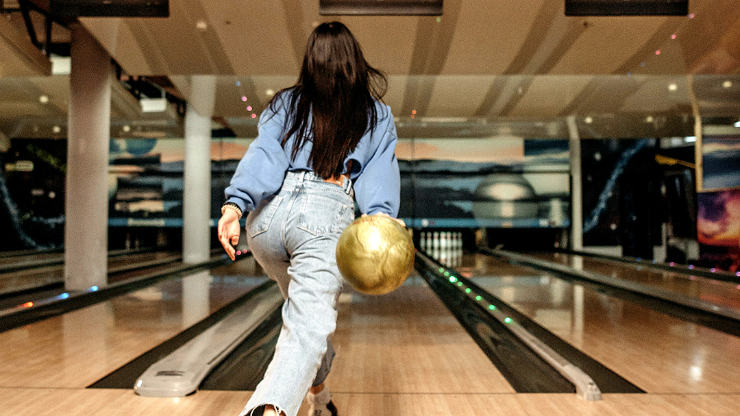 A girl at the bowling