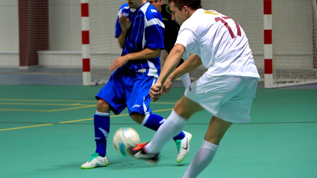 Guys playing football